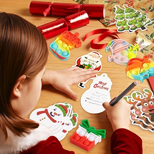 24 парчиња Божиќни мини поп-клуч за клучеви за играчки пакет за деца- олеснување на стресот Божиќни поп меур сензорни играчки со ознаки за деца