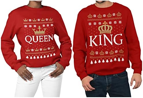 Кинг и кралица што одговараат на неговите и нејзините круни грди Божиќни парови поставуваат џемпер